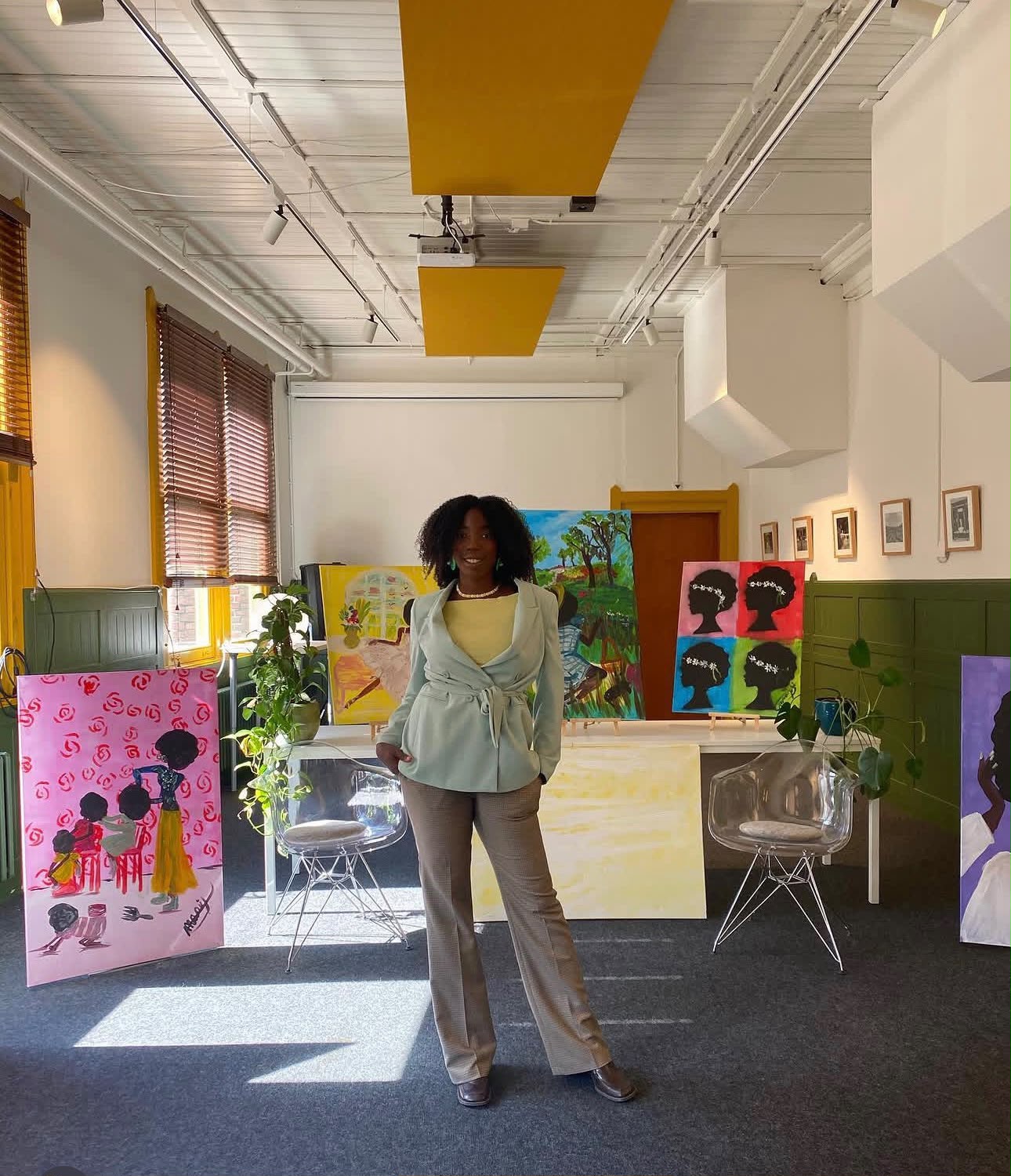Studio show with works displayed across the room